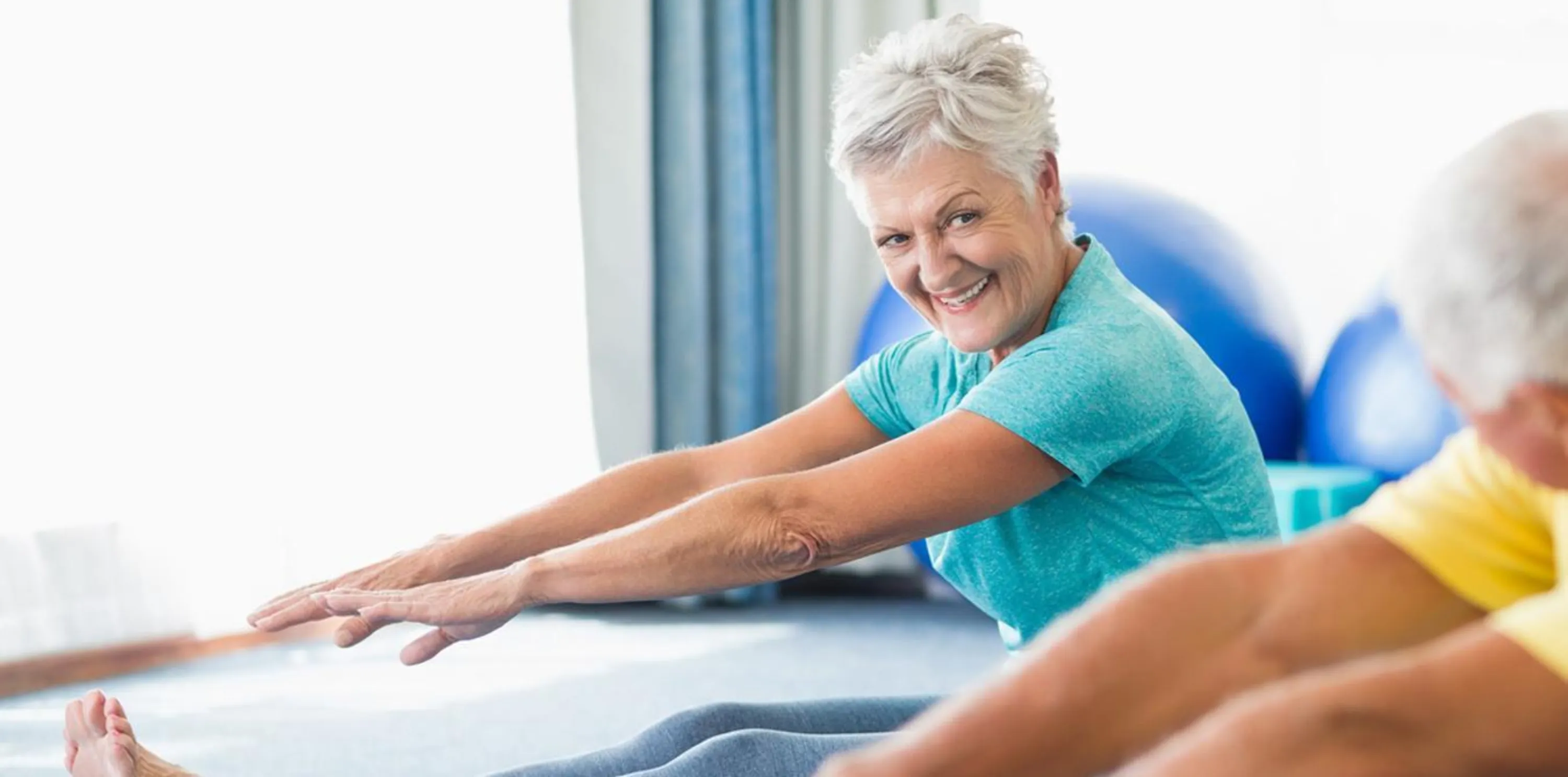 Gymnastik-Paar auf der Matte